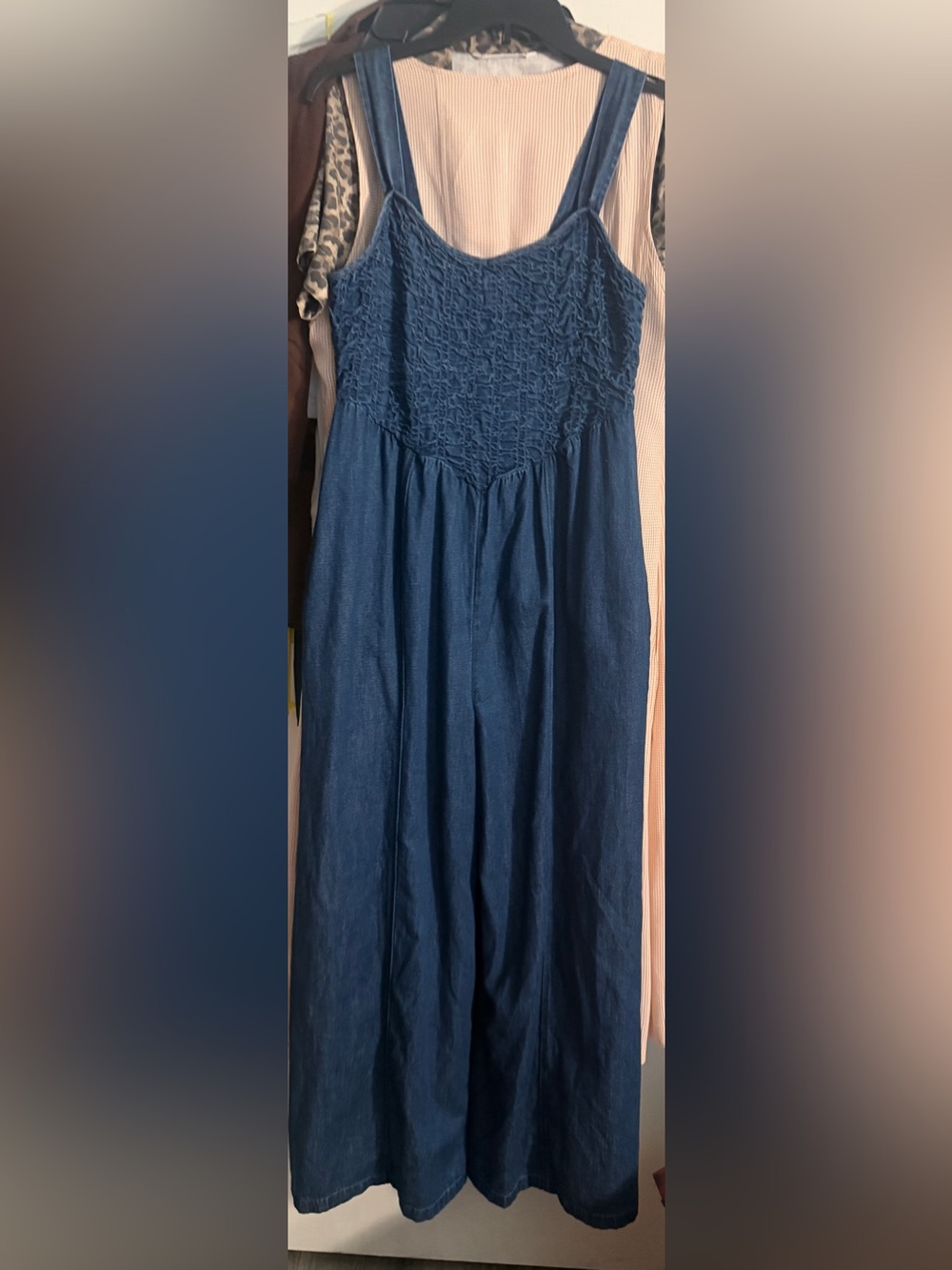 AE Light denim wide leg jumpsuit with pockets.